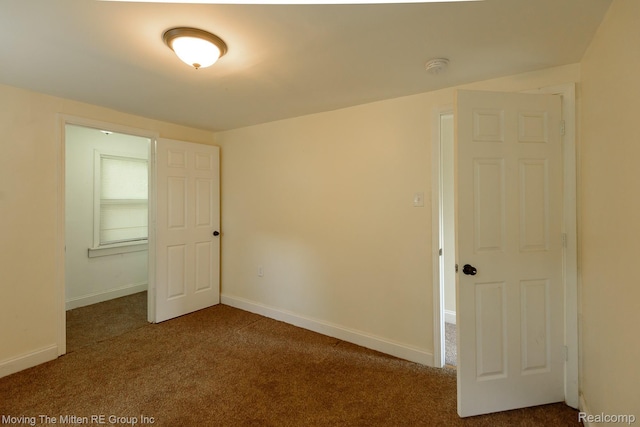 11954 Timken Ave, Warren, MI 48089 - unfurnished bedroom with carpet floors and baseboards
