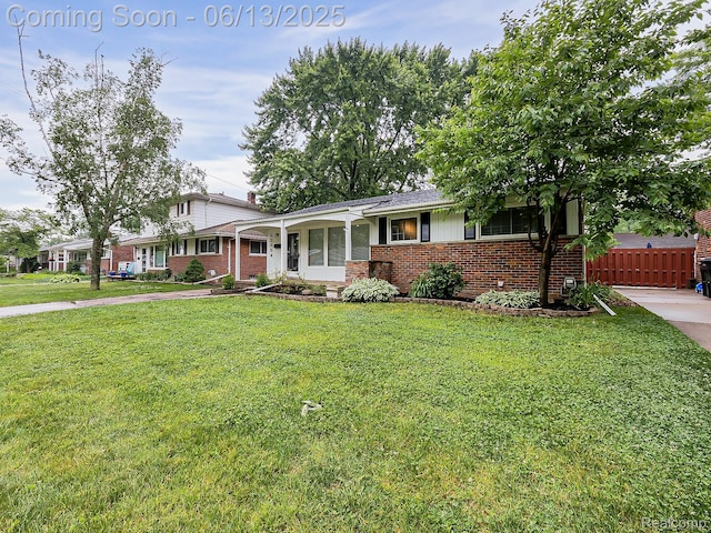 22854 Lingemann St, Saint Clair Shores, MI 48080 - view of front of house featuring brick siding and covered porch
