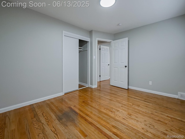22854 Lingemann St, Saint Clair Shores, MI 48080 - unfurnished bedroom featuring light wood-style flooring and a closet
