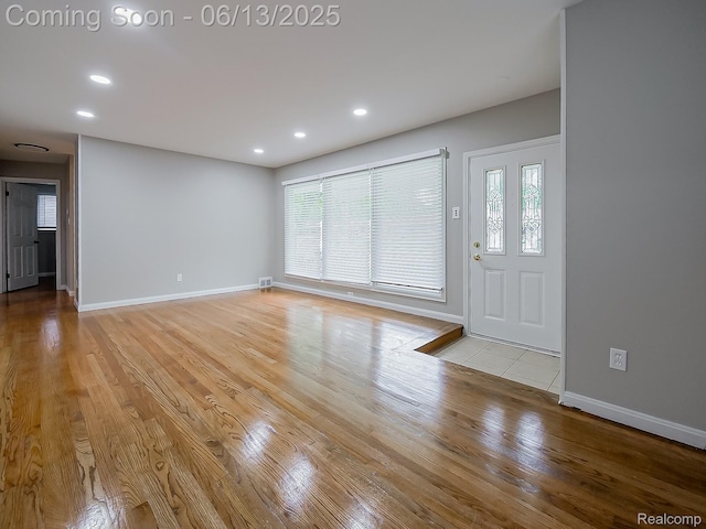 22854 Lingemann St, Saint Clair Shores, MI 48080 - foyer entrance with light wood-style flooring and recessed lighting