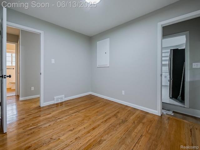 22854 Lingemann St, Saint Clair Shores, MI 48080 - unfurnished room featuring electric panel and light wood finished floors