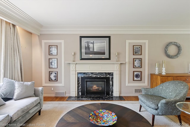 1831 Hampden Rd, Flint, MI 48503 - living area with wood finished floors, ornamental molding, and a high end fireplace