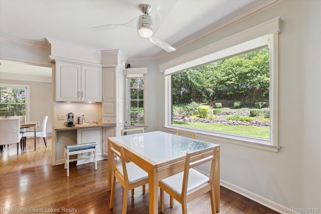 1831 Hampden Rd, Flint, MI 48503 - dining area featuring wood finished floors, ornamental molding, and ceiling fan