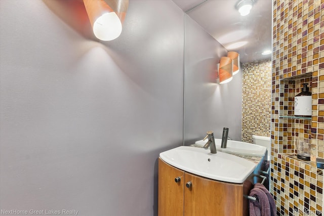 1831 Hampden Rd, Flint, MI 48503 - bathroom with vanity and tile walls
