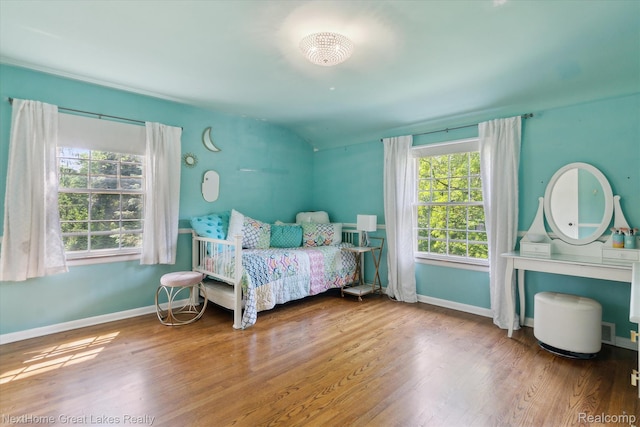 1831 Hampden Rd, Flint, MI 48503 - bedroom featuring multiple windows and wood finished floors