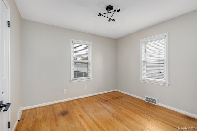 852 Cambridge Rd, Berkley, MI 48072 - empty room featuring baseboards and light wood finished floors