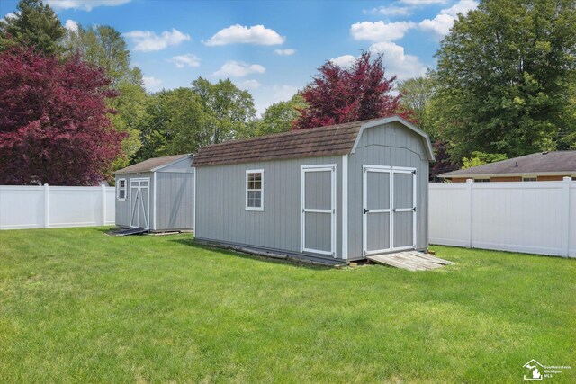 1115 Birchwood Dr, Temperance, MI 48182 - view of shed featuring a fenced backyard