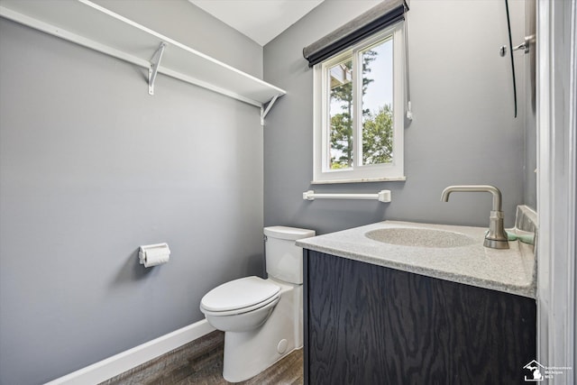 1115 Birchwood Dr, Temperance, MI 48182 - half bathroom featuring wood finished floors and vanity