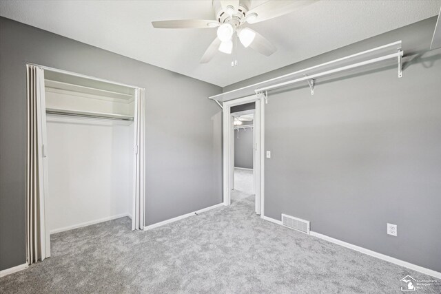 1115 Birchwood Dr, Temperance, MI 48182 - unfurnished bedroom featuring carpet flooring, ceiling fan, and a closet