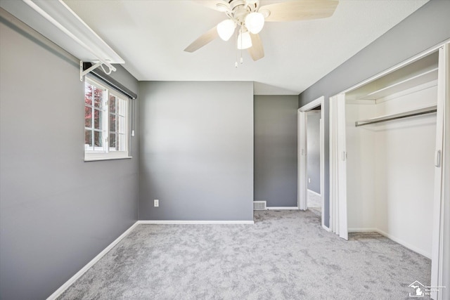1115 Birchwood Dr, Temperance, MI 48182 - unfurnished bedroom featuring carpet flooring, a closet, and ceiling fan