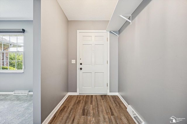 1115 Birchwood Dr, Temperance, MI 48182 - entryway featuring baseboards and wood finished floors