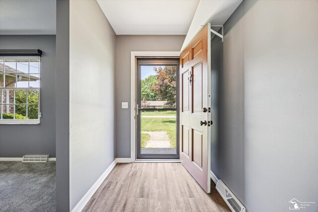 1115 Birchwood Dr, Temperance, MI 48182 - entryway with baseboards and wood finished floors