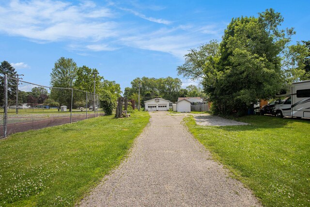 716 Langrick St, Sturgis, MI 49091 - view of front of home with a detached garage