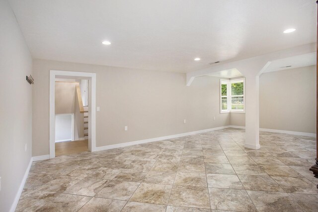 716 Langrick St, Sturgis, MI 49091 - empty room with stairs and recessed lighting