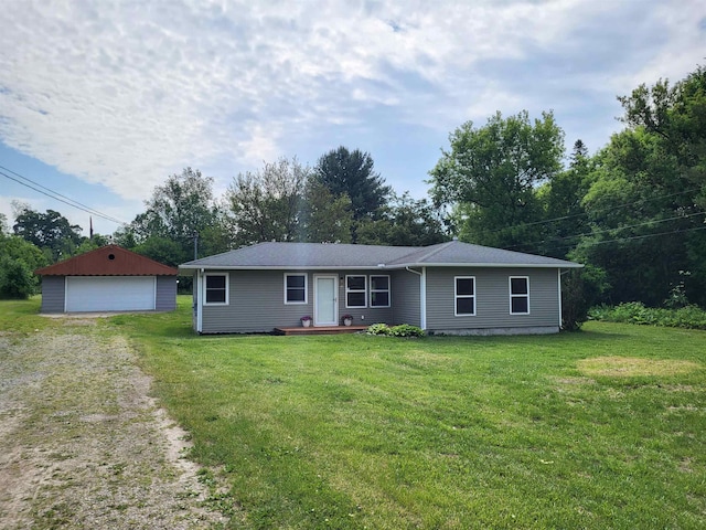 3456 N Irish Rd, Davison, MI 48423 - single story home featuring a detached garage, a front lawn, and an outdoor structure
