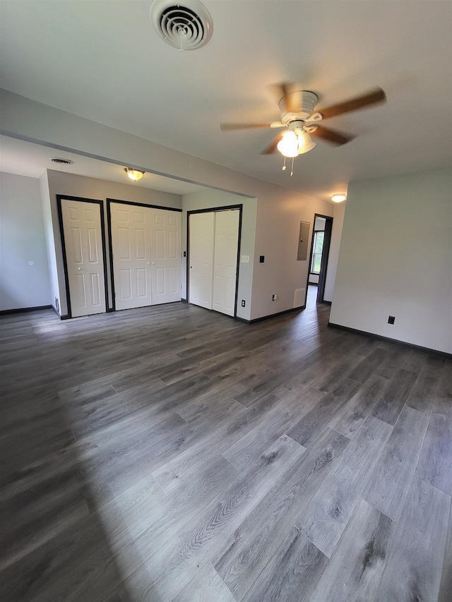 3456 N Irish Rd, Davison, MI 48423 - unfurnished living room with dark wood finished floors and ceiling fan