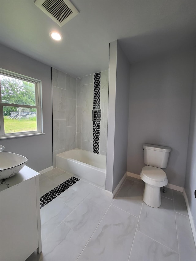 3456 N Irish Rd, Davison, MI 48423 - full bath with vanity, washtub / shower combination, and recessed lighting