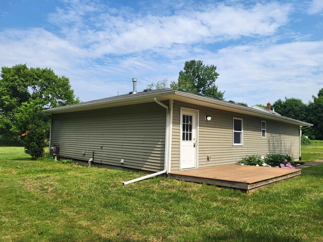 3456 N Irish Rd, Davison, MI 48423 - rear view of property featuring a deck and a yard