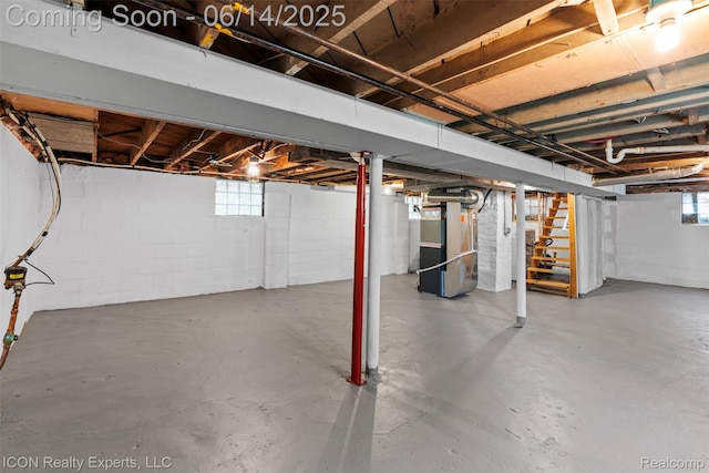 246 E Chesterfield St, Ferndale, MI 48220 - basement featuring stairs, healthy amount of natural light, and heating unit