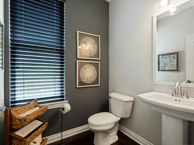 13531 Brampton Ct, Utica, MI 48315 - half bathroom with toilet and wood finished floors