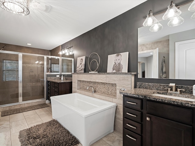 13531 Brampton Ct, Utica, MI 48315 - bathroom with a shower stall, two vanities, and a bath