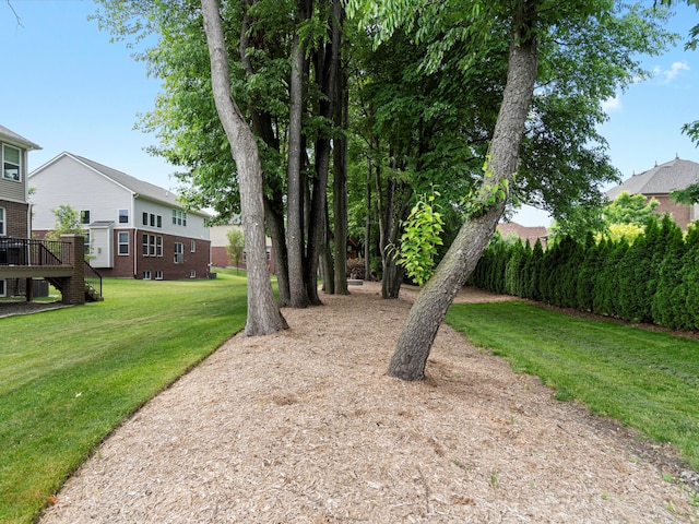 13531 Brampton Ct, Utica, MI 48315 - view of green lawn featuring a wooden deck