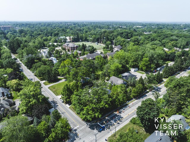 3 Woodward Ln SE, Grand Rapids, MI 49506 - aerial overview of property's location with a heavily wooded area