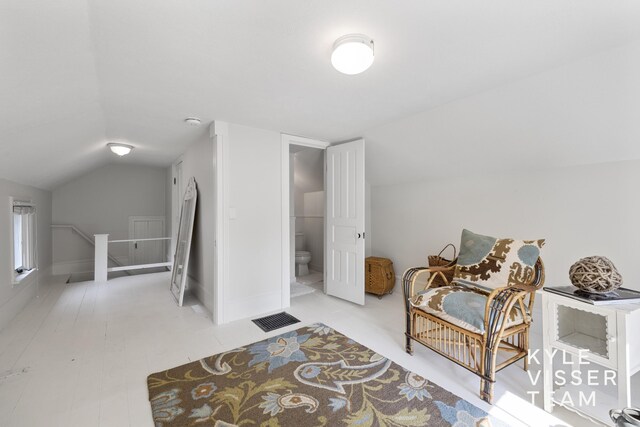 3 Woodward Ln SE, Grand Rapids, MI 49506 - living area with lofted ceiling and baseboards