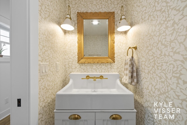 3 Woodward Ln SE, Grand Rapids, MI 49506 - bathroom with wallpapered walls and vanity