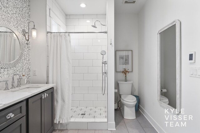 3 Woodward Ln SE, Grand Rapids, MI 49506 - full bathroom featuring vanity, a tile shower, tile patterned floors, and recessed lighting
