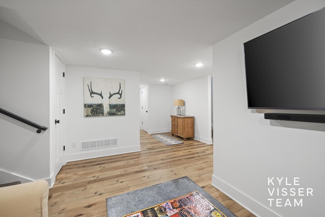 3 Woodward Ln SE, Grand Rapids, MI 49506 - interior space featuring wood finished floors and recessed lighting
