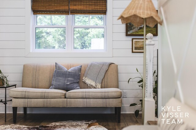 3 Woodward Ln SE, Grand Rapids, MI 49506 - living area featuring plenty of natural light, wood finished floors, and wood walls