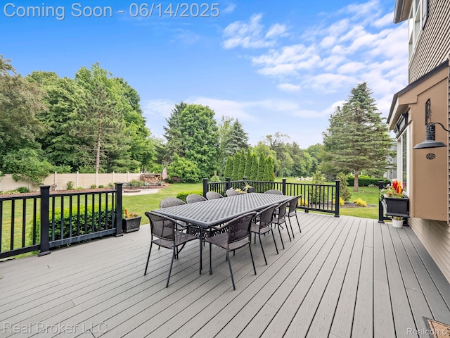 7235 Goldenrod Ct, Brighton, MI 48116 - wooden deck with outdoor dining area