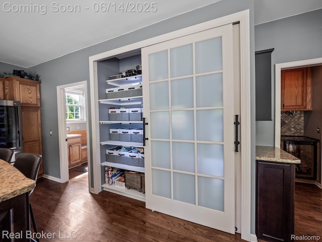 7235 Goldenrod Ct, Brighton, MI 48116 - pantry with wine cooler
