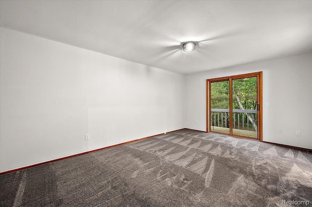 2696 Cedar Key Dr, Lake Orion, MI 48360 - empty room featuring carpet flooring and baseboards