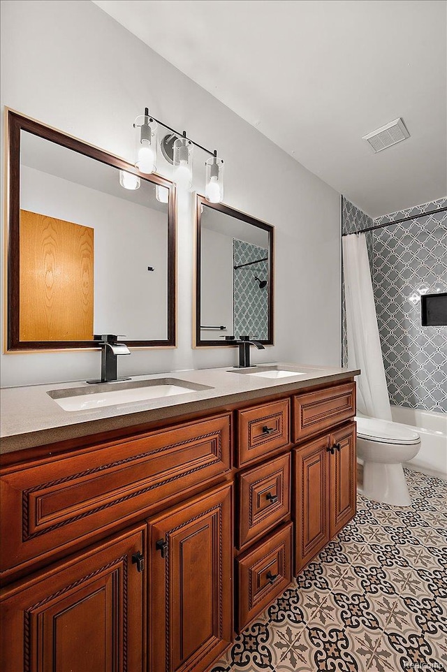 2696 Cedar Key Dr, Lake Orion, MI 48360 - bathroom featuring double vanity, shower / tub combo, and tile patterned flooring