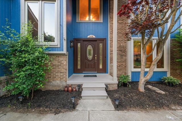 2696 Cedar Key Dr, Lake Orion, MI 48360 - doorway to property featuring brick siding