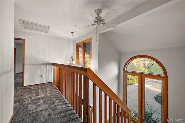 2696 Cedar Key Dr, Lake Orion, MI 48360 - hall featuring an upstairs landing, dark colored carpet, and lofted ceiling