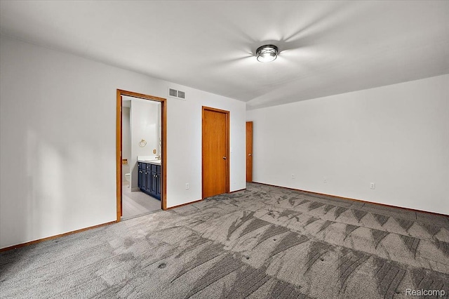 2696 Cedar Key Dr, Lake Orion, MI 48360 - unfurnished bedroom featuring light carpet and ensuite bathroom