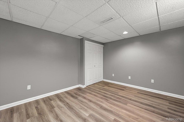 2696 Cedar Key Dr, Lake Orion, MI 48360 - unfurnished room featuring a drop ceiling, wood finished floors, and recessed lighting