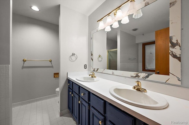 2696 Cedar Key Dr, Lake Orion, MI 48360 - bathroom with double vanity, a shower stall, and tile patterned flooring