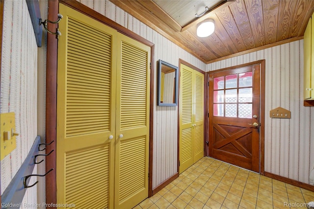290 Florawood Blvd, Waterford, MI 48327 - entryway featuring wallpapered walls, wood ceiling, and light tile patterned floors