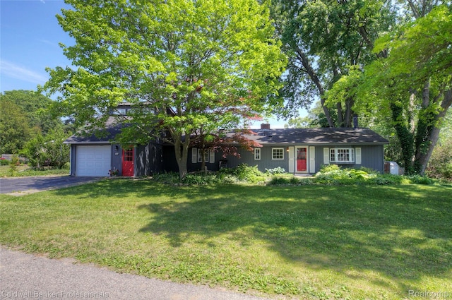 290 Florawood Blvd, Waterford, MI 48327 - ranch-style home with driveway, a front yard, and an attached garage