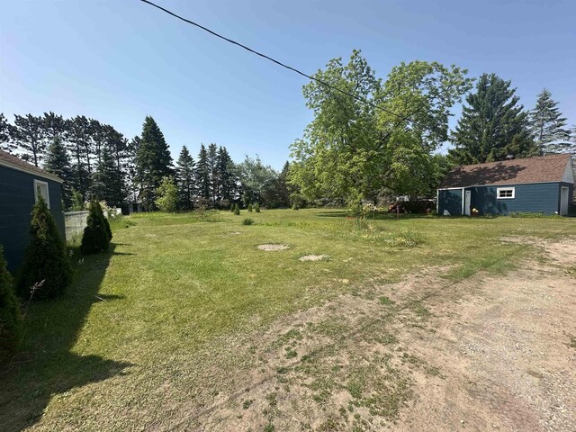 501 W 13th St, Cadillac, MI 49601 - view of grassy yard