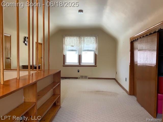 1811 Goddard Rd, Lincoln Park, MI 48146 - additional living space featuring vaulted ceiling and carpet floors