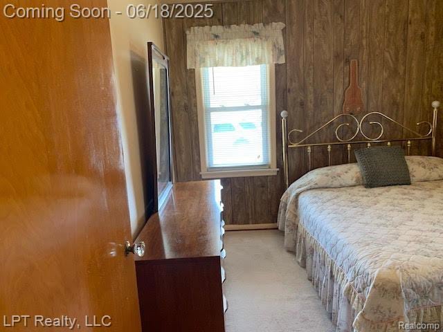 1811 Goddard Rd, Lincoln Park, MI 48146 - carpeted bedroom featuring wooden walls