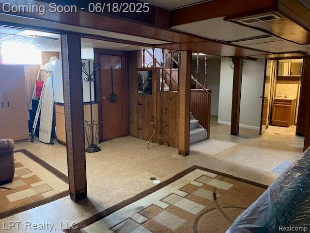 1811 Goddard Rd, Lincoln Park, MI 48146 - below grade area featuring stairs and tile patterned floors