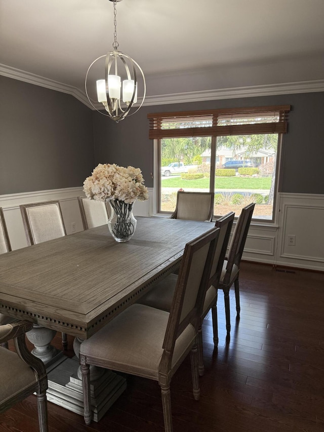 5653 Powder Horn Dr, West Bloomfield, MI 48322 - dining area with a chandelier, crown molding, wainscoting, hardwood / wood-style flooring, and a decorative wall