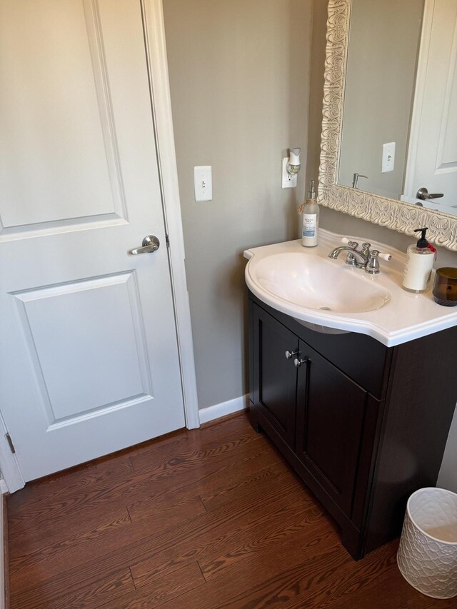 5653 Powder Horn Dr, West Bloomfield, MI 48322 - bathroom with vanity and wood finished floors