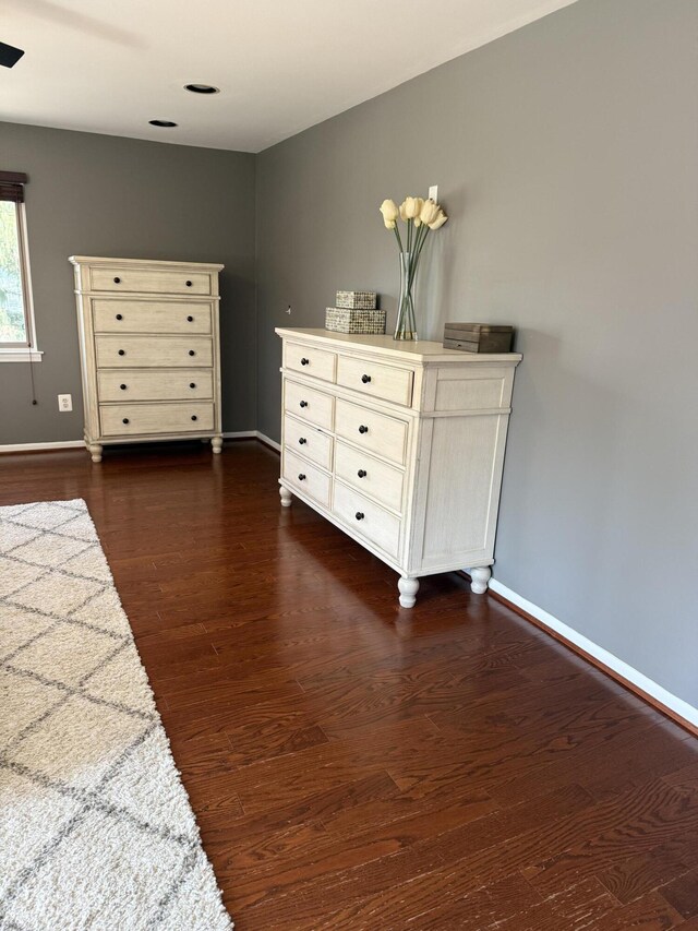 5653 Powder Horn Dr, West Bloomfield, MI 48322 - bedroom with dark wood finished floors and a ceiling fan